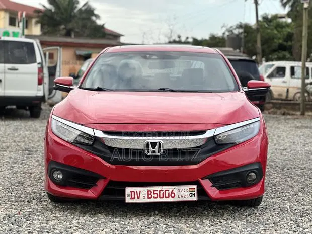 Honda Civic Touring 2dr Coupe (1.5L 4cyl) 2016 Red · Photo 1