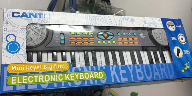 Kids 37 Key Electronic Keyboard With Microphone · Photo 1