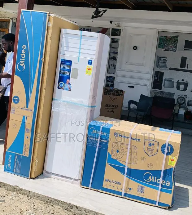 Experience New = 3.0 Horsepower Midea Floor Standing AC · Photo 1