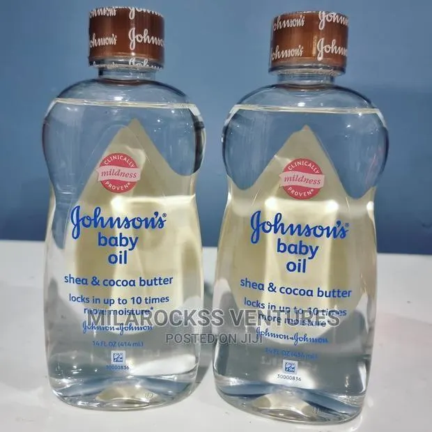 Johnson's Shea Cocoa Butter Baby Oil. · Photo 1
