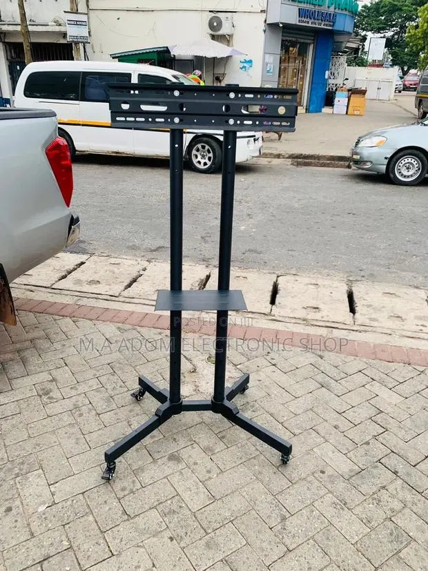 Reliable Mobile Tv Stand With Wheels for 32”-70”(Black). · Photo 1
