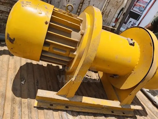 Heavy-Duty Yellow Electric Winch or Hoist Motor · Photo 2