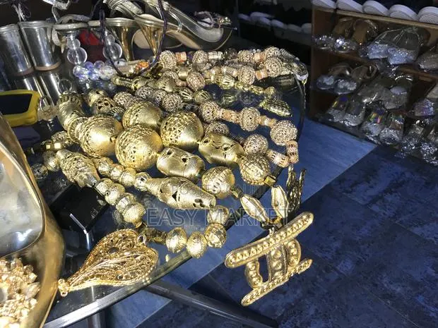 Gold Accessories With Kente for All Ages · Photo 1