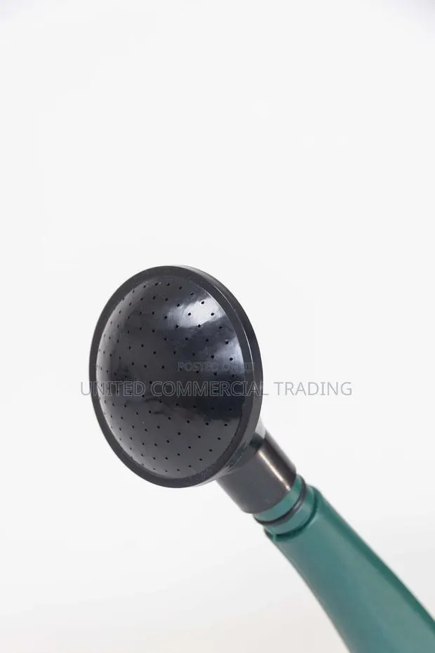 Classic Plastic Watering Can · Photo 1