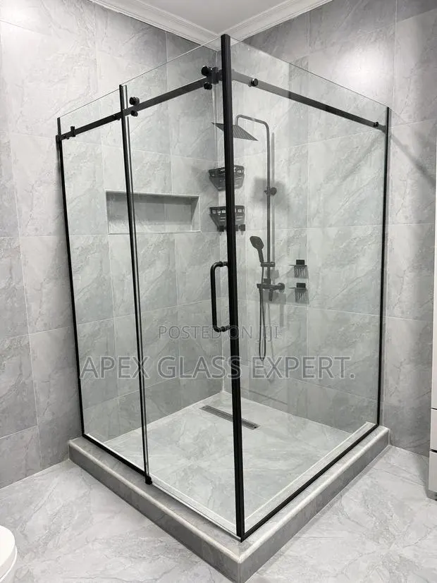 L-shaped Custom Slide Shower Enclosure. · Photo 1