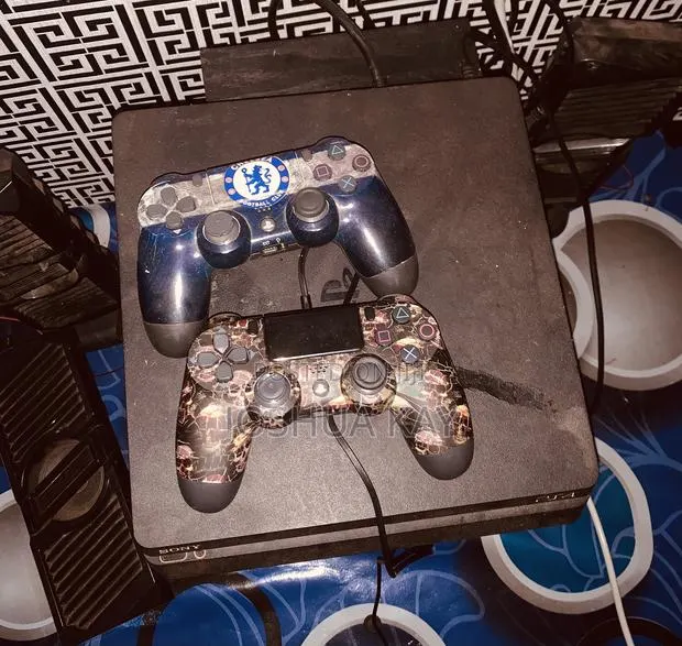 PlayStation 4 (Four ) Pro Slim (Black) · Photo 1