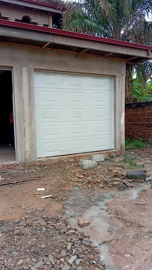 Garage Doors With Remote · Photo 1