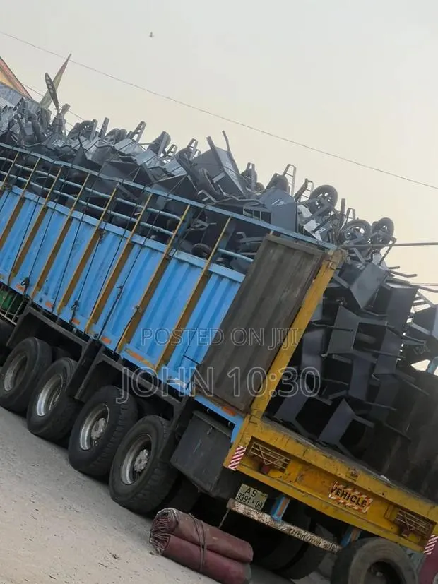 TITLE: Heavy-Duty Wheelbarrows for Construction and Building Work · Photo 1