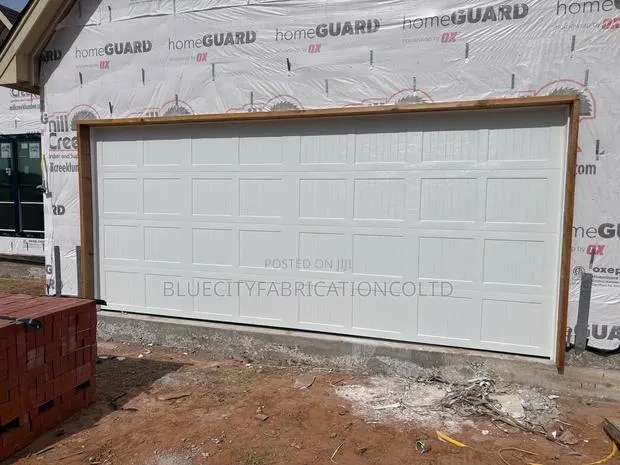 Sectional Garage Door With Remote All Colors · Photo 1
