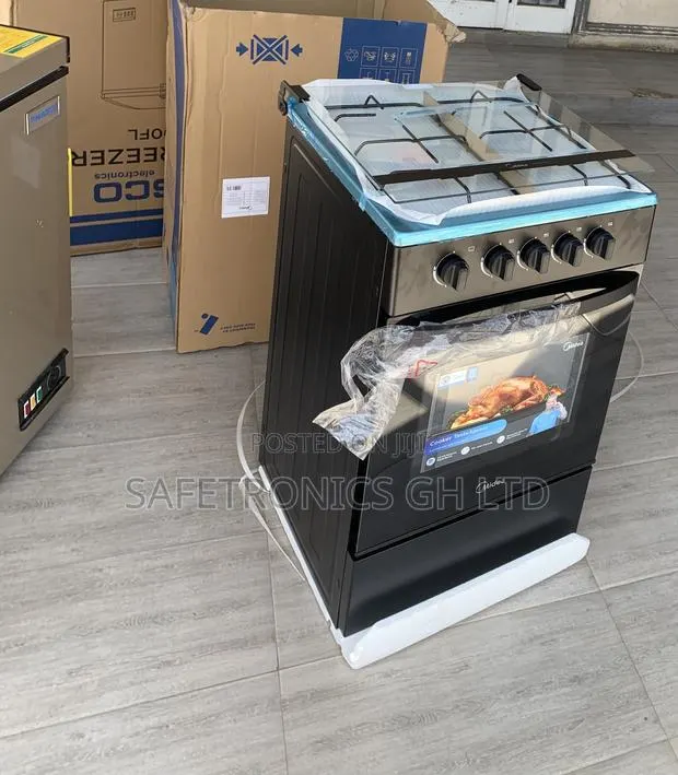 Newly Approved Black Midea 4 Burner Gas Cooker · Photo 1