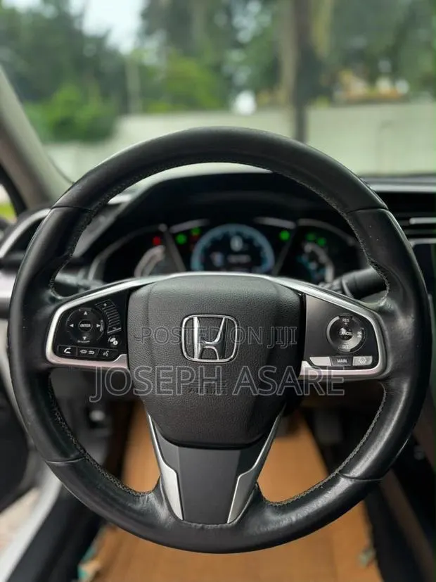 Honda Civic Touring 2dr Coupe (1.5L 4cyl) 2016 White · Photo 1