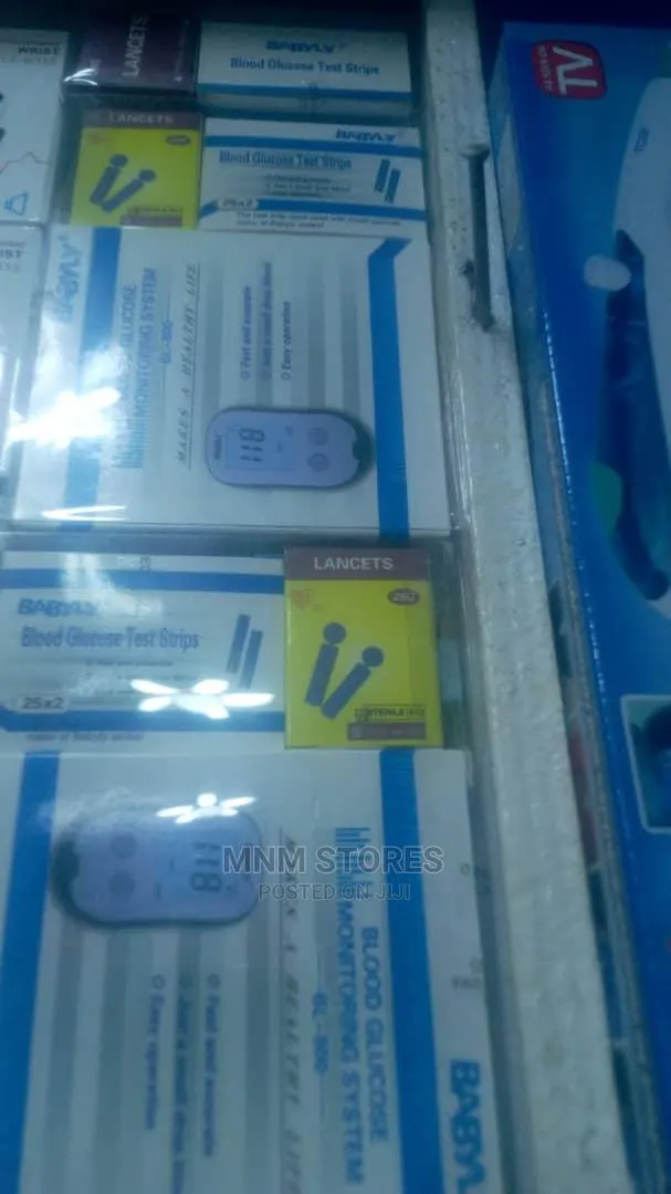 Blood Glucose Meter With Strips and Lancet · Photo 1