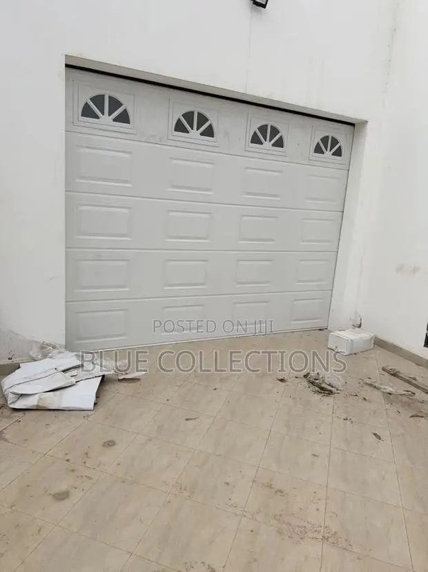 Automatic Garage Doors With Ark Fanlight · Photo 1