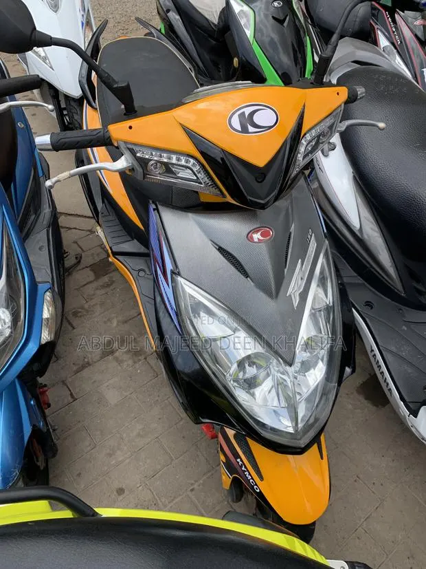 Kymco 2020 Yellow · Photo 1