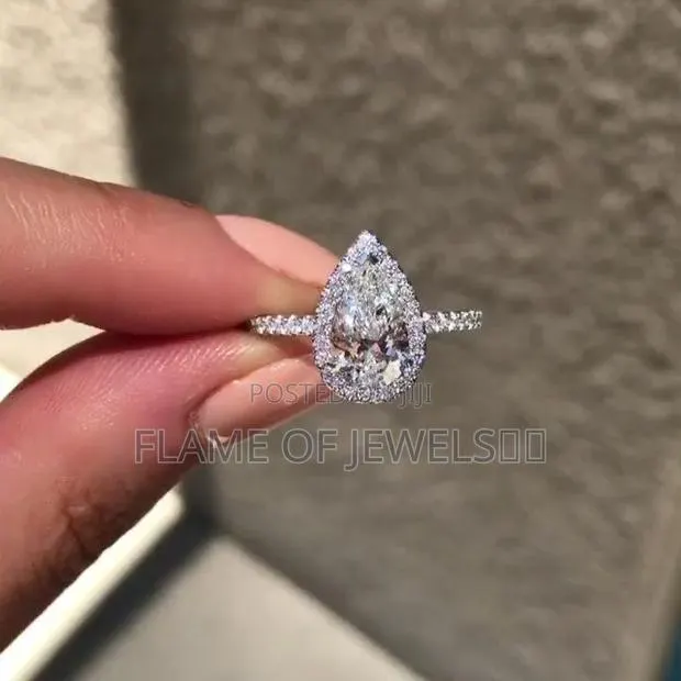 Oval Tear Drop Promise Rings · Photo 1
