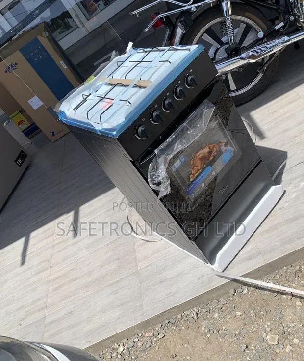 Kindly Buy Midea 4 Burner Gas Cooker Black · Photo 1