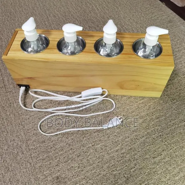 4 Bottles Set Oil Warmer · Photo 1