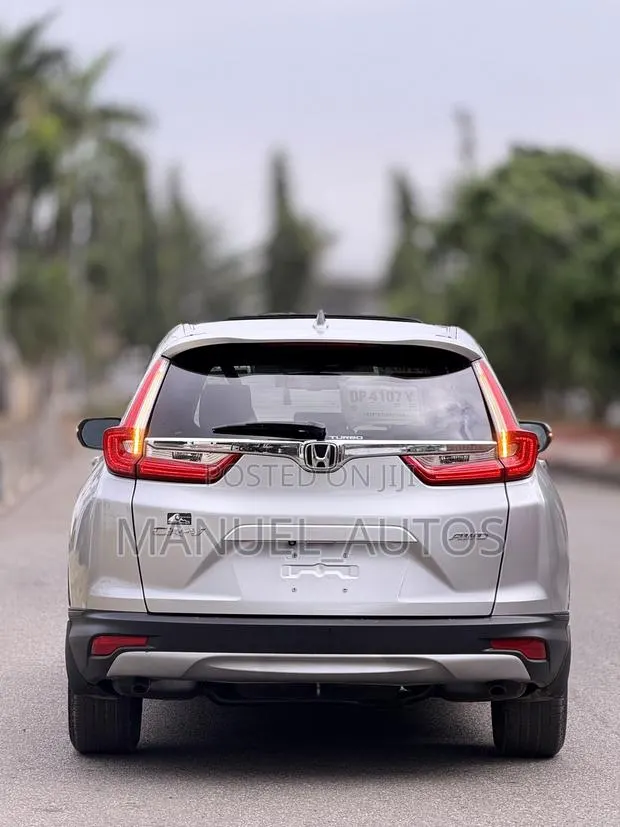 Honda CR-V EX-L AWD 2019 Silver · Photo 1
