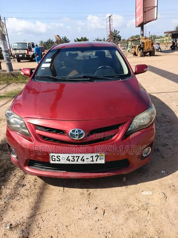 Toyota Corolla LE 4dr Sedan (1.8L 4 cyl 4A) 2009 Red · Photo 1