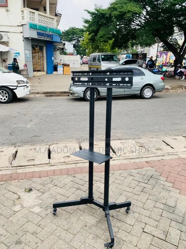 Original Mobile Tv Stand With Wheels for 32”-70” Tv(Black). · Photo 1