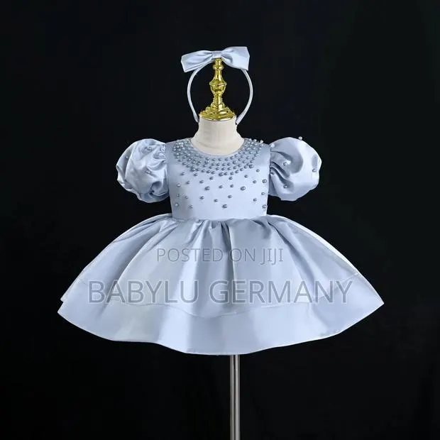 Premium Blue Dress With Matching Hair Accessory · Photo 1