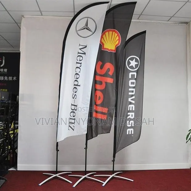 Teardrop and Feather Flag Stand With Branding · Photo 1
