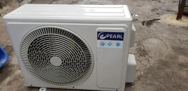 1.5hp R-410 Pearl Outdoor Unit · Photo 1
