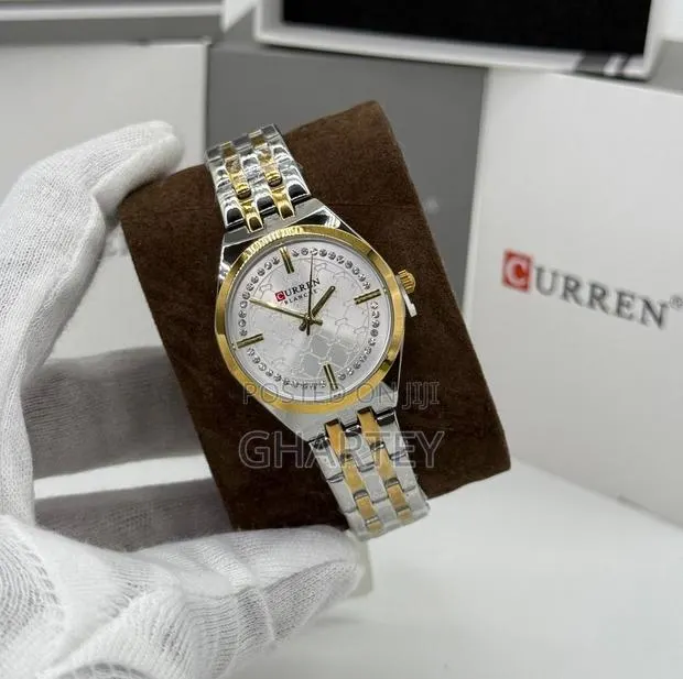 Curren Luxury Round Face Two Toned Silver Watch for Women · Photo 1