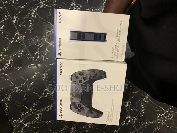 Sony Ps5 Dualsense Controller and Ps Charging Station Combo · Photo 1