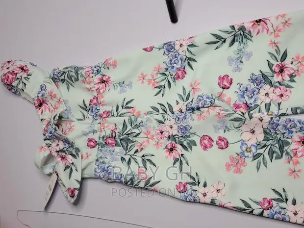 Girls Mint Floral Jumpsuit · Photo 1