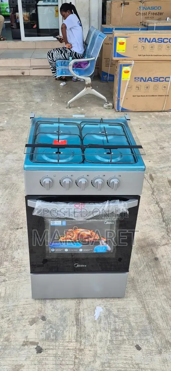 Cooking Make Easy Midea 50 by 50 4 Burners and Oven · Photo 1