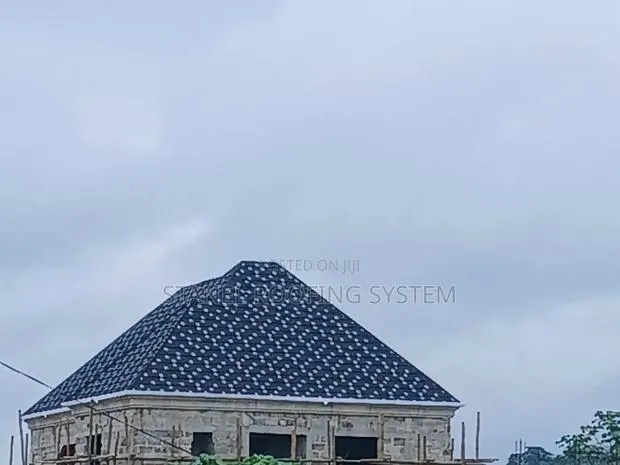 Quality Roof Installations and Rain Gutters · Photo 1