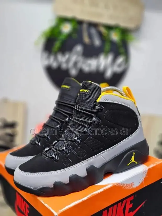 Jordan 9 Charcoal Black and Yellow · Photo 1