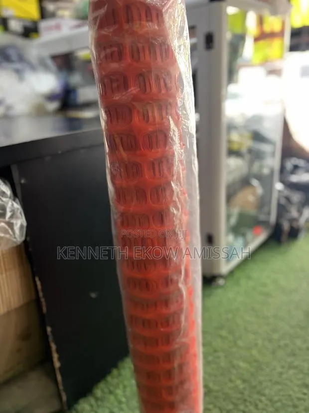 Orange Plastic Safety Barrier Net · Photo 1