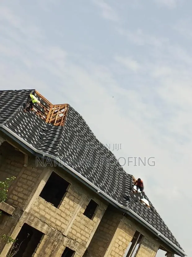 Stone Coated Black and White Shingles · Photo 1
