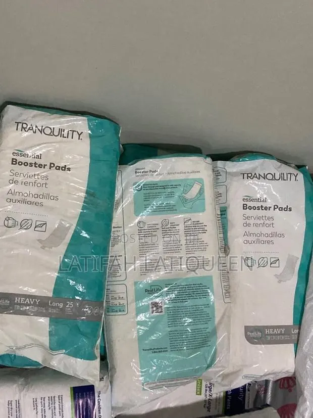 Be: "Tranquility Booster Pads - Extra Absorbency, Extra Protection! · Photo 1