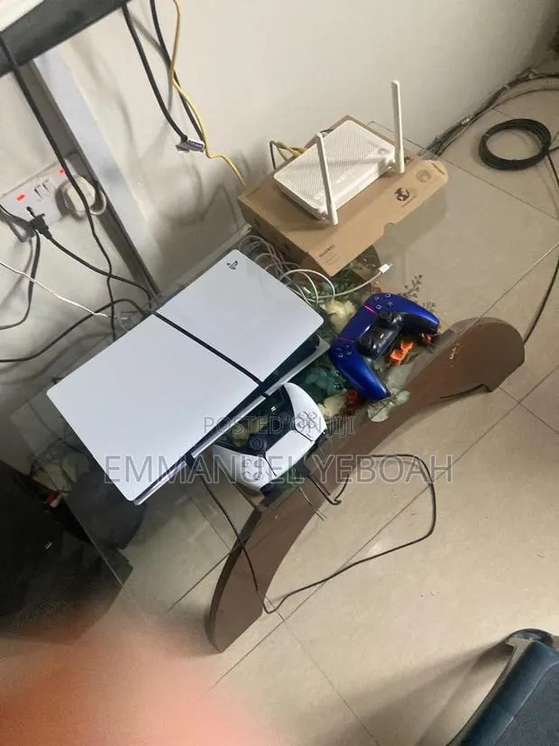 PS5 Digital With 2 Controllers and 8 Games · Photo 1