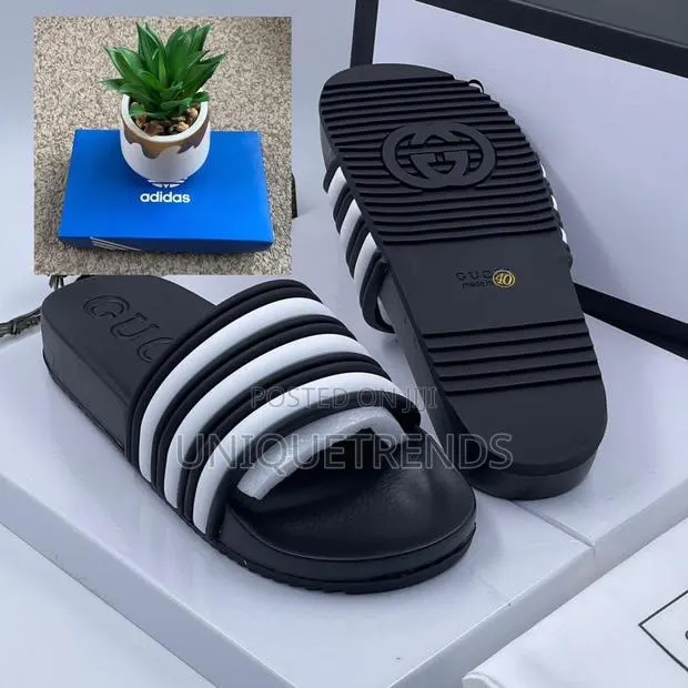 Original Black and White Gucci Slides · Photo 1