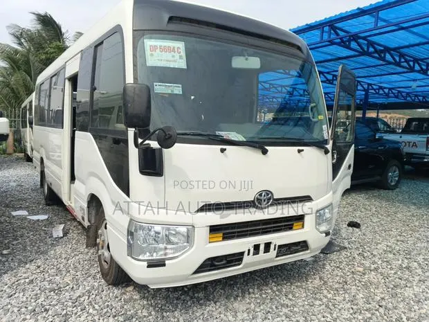 Toyota Coaster 2022 White · Photo 1