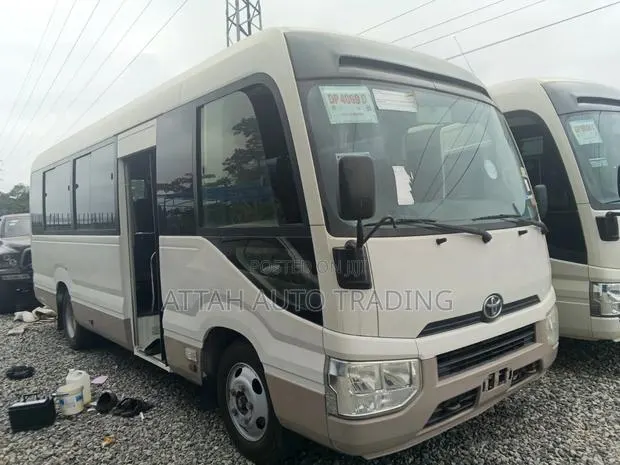 Toyota Coaster 2017 White · Photo 1