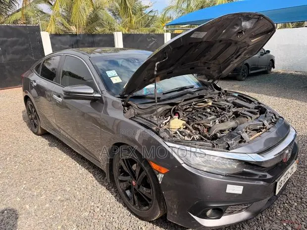 Honda Civic Touring 4dr Sedan (1.5L 4cyl) 2016 Gray · Photo 1
