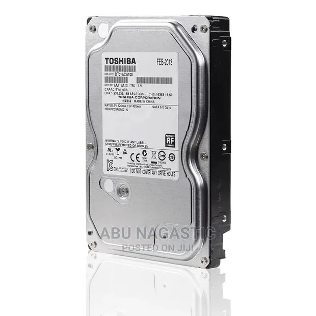 One (1) Terabyte Toshiba Hard Drive 1000GB · Photo 1