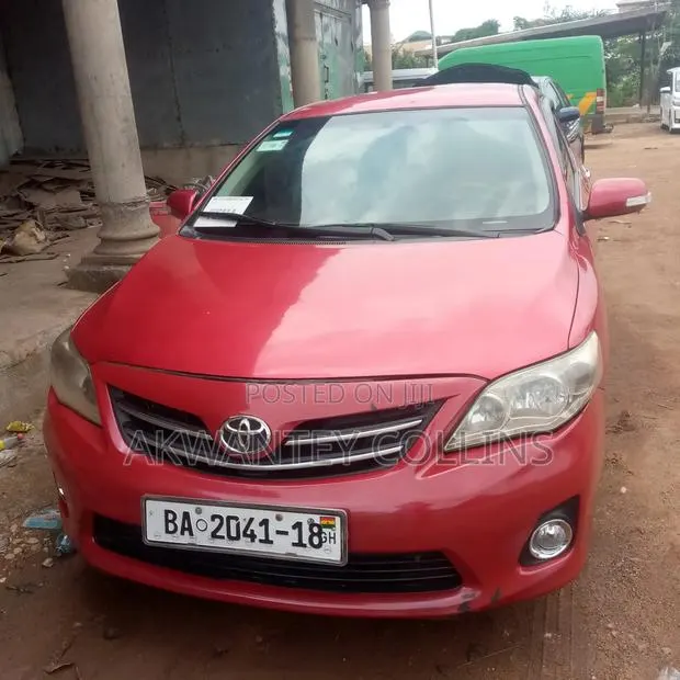 Toyota Corolla 2010 Red · Photo 1