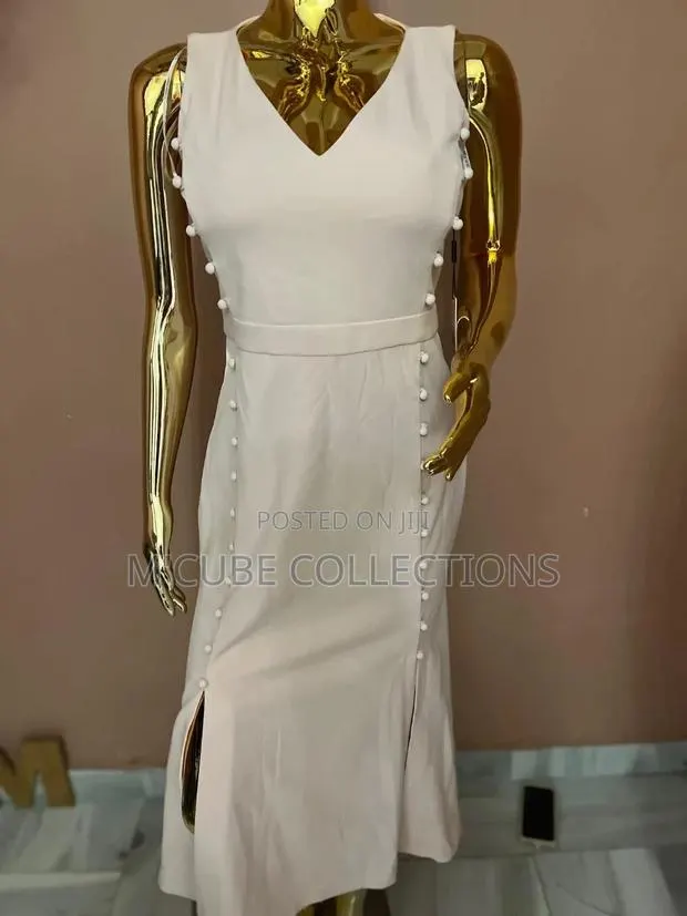 Ivory Side-Button Midi Dress by Calvin Klien · Photo 1