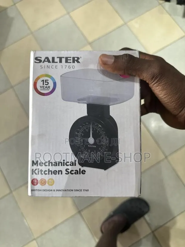Salter Mechanical Kitchen Scale With A Black Dial And A 5 Kg Capacity · Photo 1