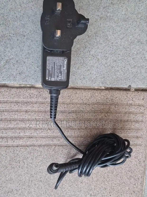 Chicony 19v 2.15a 40w AC Adapter Charger (Model W10-040n1a) · Photo 1