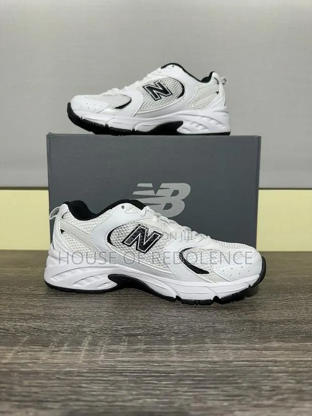 New Balance 530 Sneakers in White/Black Colorway · Photo 1