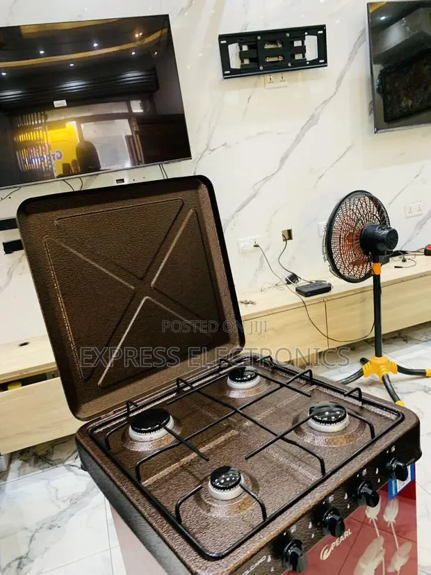 Ultra Modern Brown Gas Cooker Table Top Volcano 4burner · Photo 1