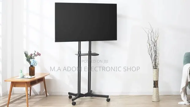 Mobile Tv Stand With Wheels 32”-70” · Photo 1