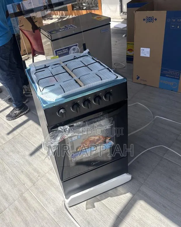 Brand New Midea 4 Burner Gas Cooker(Oven and Grill) · Photo 1